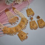 Shimmery Gold Toned Pearls and Beads Necklace Set With Paasa