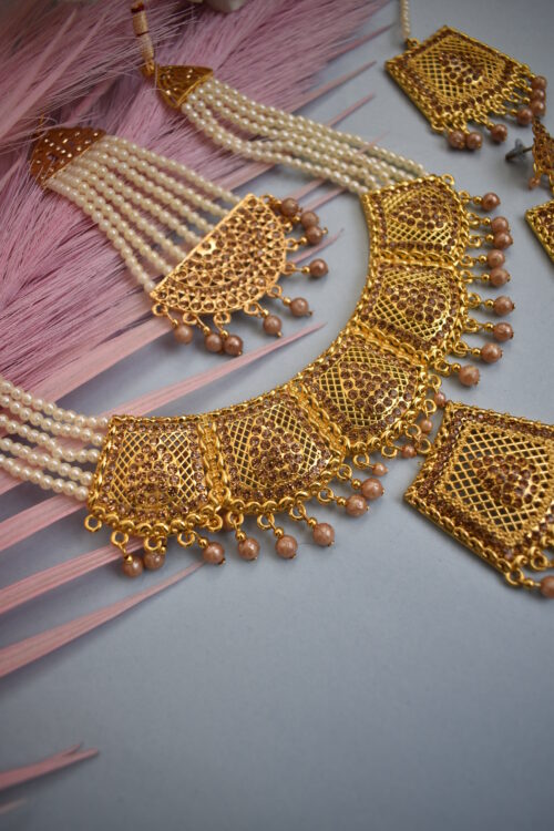 Shimmery Gold Toned Pearls and Beads Necklace Set With Paasa