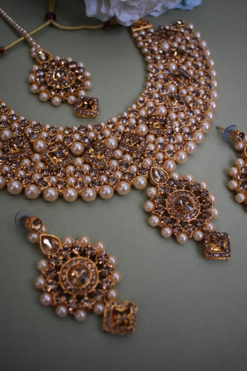 Stone Studded And Pearl Embellished Wedding Wear Necklace Set