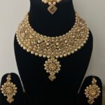 Stone Studded And Pearl Embellished Wedding Wear Necklace Set