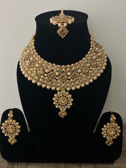 Stone Studded And Pearl Embellished Wedding Wear Necklace Set